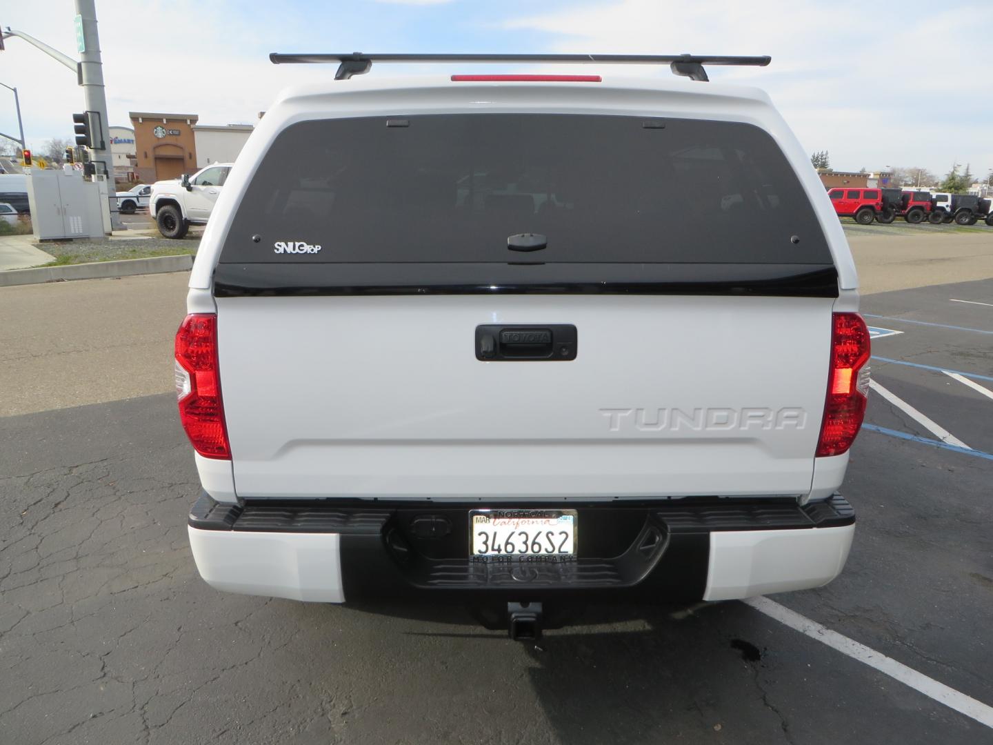 2019 White /BLACK Toyota Tundra SR5 5.7L V8 CrewMax 4WD (5TFDY5F19KX) with an 5.7L V8 DOHC 32V engine, 6A transmission, located at 2630 Grass Valley Highway, Auburn, CA, 95603, (530) 508-5100, 38.937893, -121.095482 - Clean leveled Tundra with 20" Fuel Maverick wheels, Nitto Ridge Grappler tires, N-Fab running boards, Snug Top camper shell with Yakima racks. - Photo#5